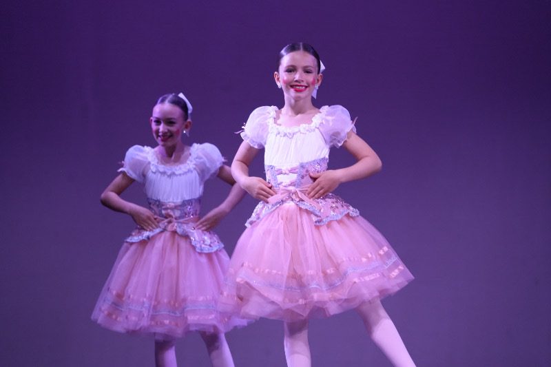Two young Fresh Coast Dance ballet dancers on stage