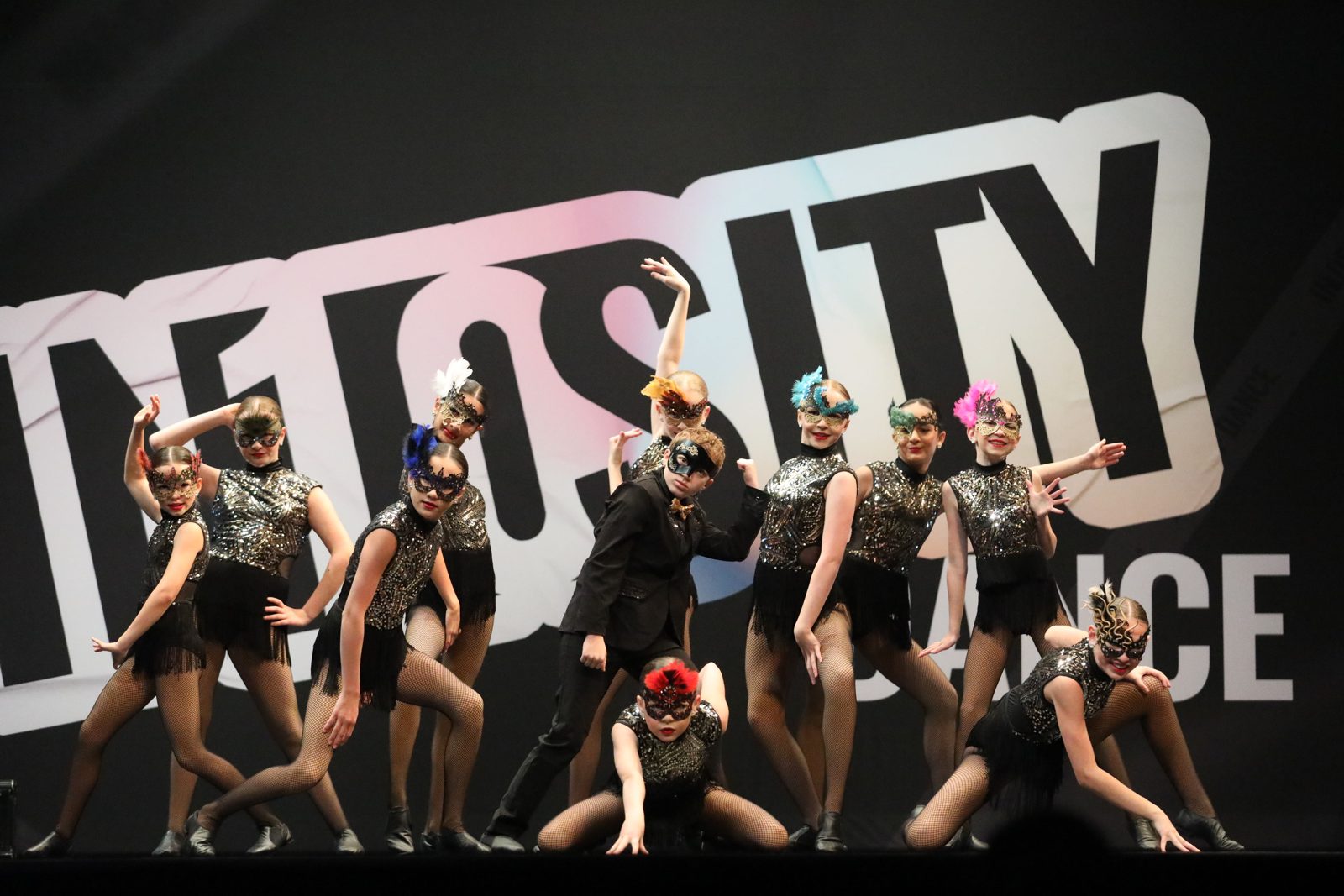 Fresh Coast Dance dancers in masquerade costumes at competition