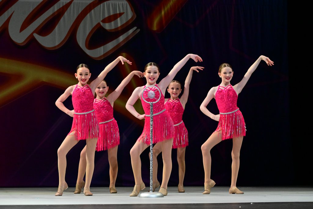 Fresh Coast Dance company dancers on stage at competition